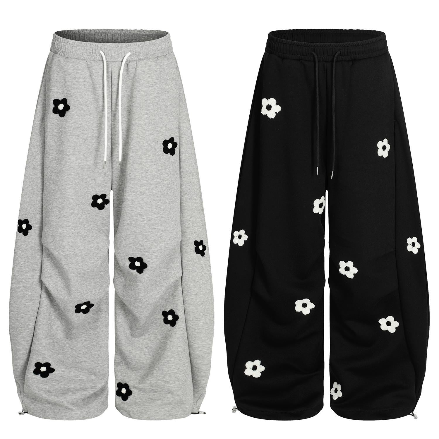 Flower embroidery curved knife sweatpants for men and women