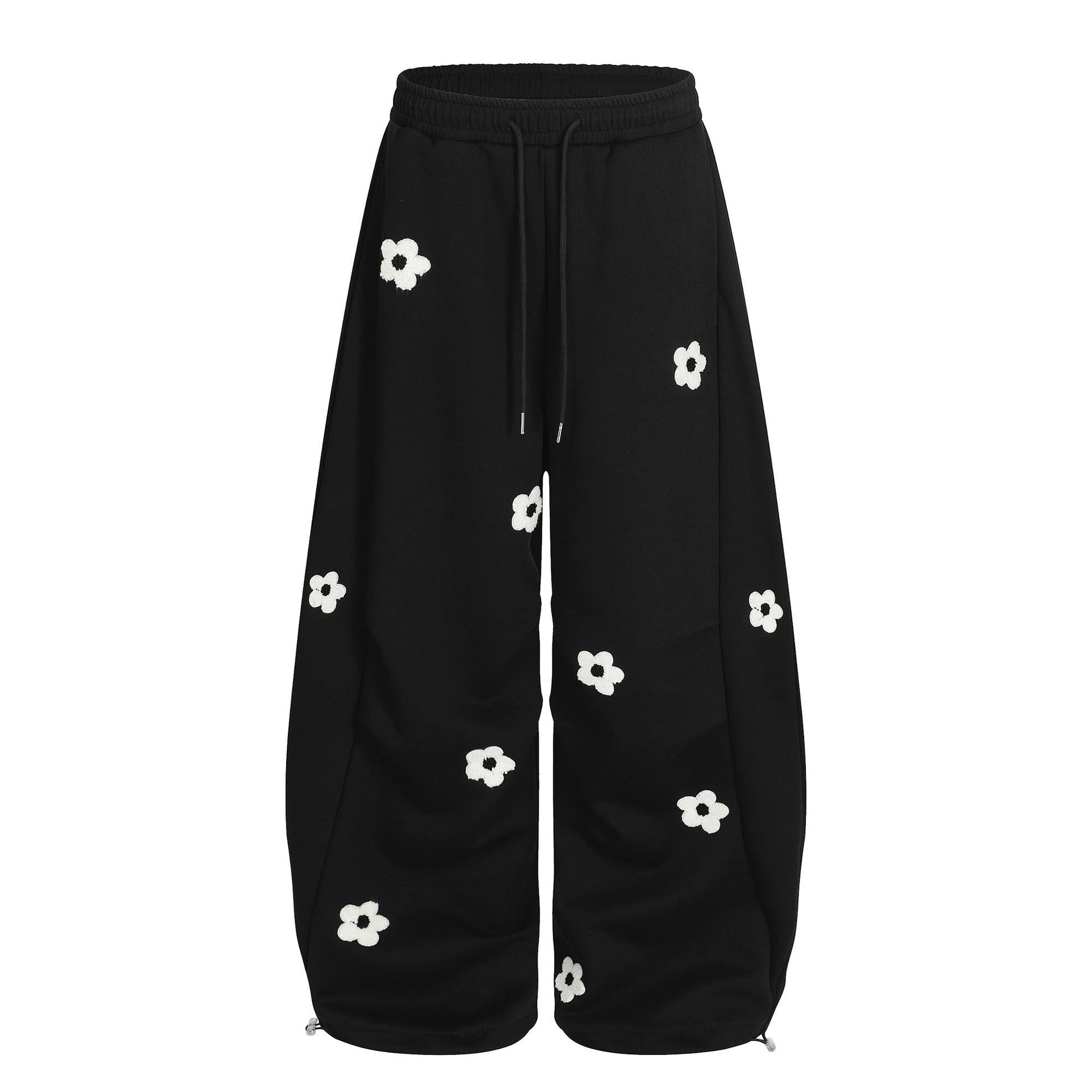 Flower embroidery curved knife sweatpants for men and women