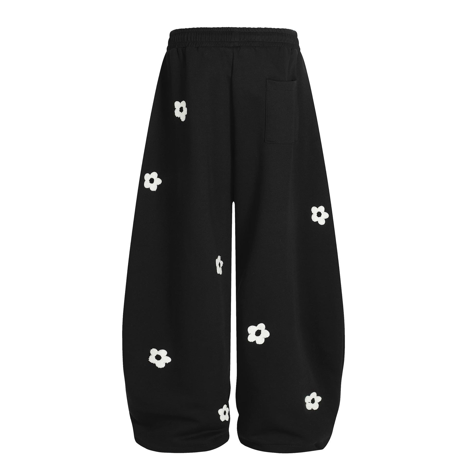 Flower embroidery curved knife sweatpants for men and women